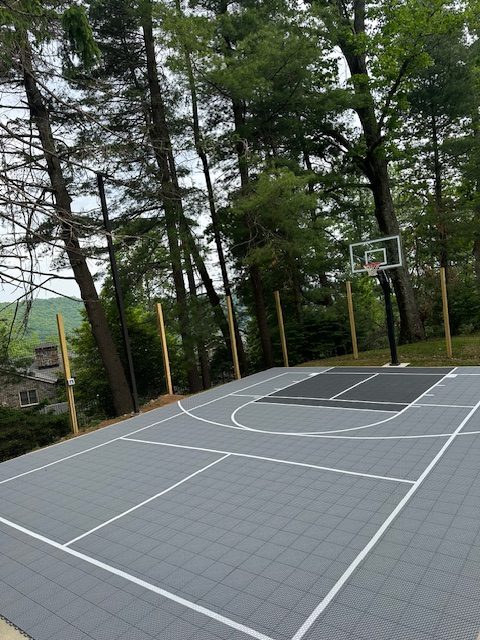 Completed residential VersaCourt basketball court Southeast Recreational NC